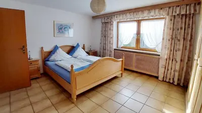 Ein Bett oder Betten in einem Zimmer der Unterkunft Ferienwohnung Nr 1, Lechbruck-Gründl, Allgäu