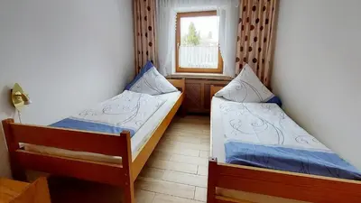 Ein Bett oder Betten in einem Zimmer der Unterkunft Ferienwohnung Nr 1, Lechbruck-Gründl, Allgäu