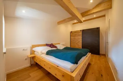 Ein Bett oder Betten in einem Zimmer der Unterkunft Haus Margreiter