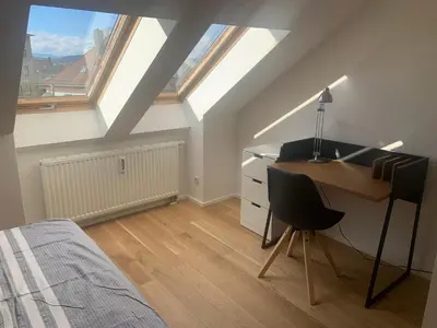 Ein Bett oder Betten in einem Zimmer der Unterkunft Apartment Wendelsteinblick