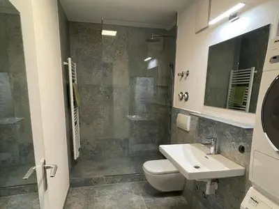 Ein Badezimmer in der Unterkunft Apartment Wendelsteinblick