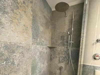 Ein Badezimmer in der Unterkunft Apartment Wendelsteinblick