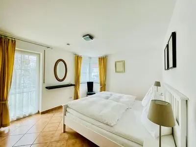 Ein Bett oder Betten in einem Zimmer der Unterkunft Birkenhof-Birke