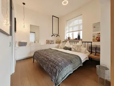 Ein Bett oder Betten in einem Zimmer der Unterkunft Luxury Omuntu-Design-Apartment Deluxe