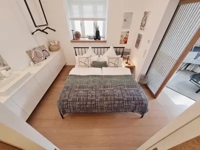 Ein Bett oder Betten in einem Zimmer der Unterkunft Luxury Omuntu-Design-Apartment Deluxe