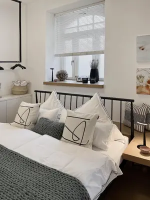 Ein Bett oder Betten in einem Zimmer der Unterkunft Luxury Omuntu-Design-Apartment Deluxe