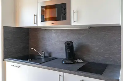 Küche/Küchenzeile in der Unterkunft Boardinghouse Kastanienring