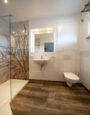Ein Badezimmer in der Unterkunft Boardinghouse Kastanienring
