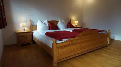 Ein Bett oder Betten in einem Zimmer der Unterkunft Hölzlhof