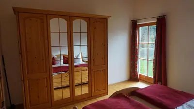 Ein Bett oder Betten in einem Zimmer der Unterkunft Hölzlhof