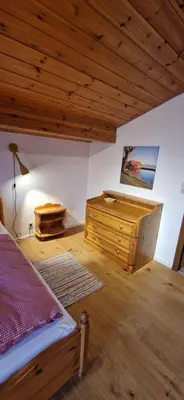 Ein Bett oder Betten in einem Zimmer der Unterkunft Chalet Chiemgau 90 qm 3 Zimmer Balkon