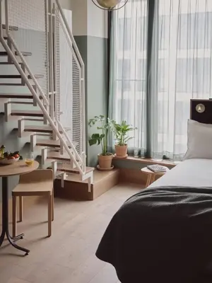 Ein Bett oder Betten in einem Zimmer der Unterkunft WunderLocke Munich