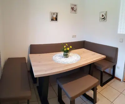 Ein Sitzbereich in der Unterkunft Apartment Morgensonne