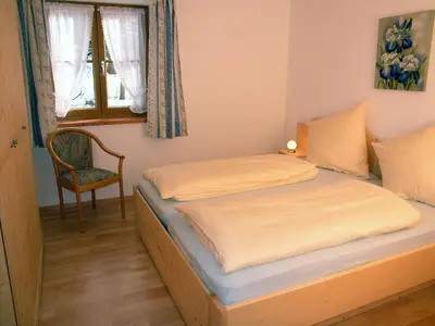 Ein Bett oder Betten in einem Zimmer der Unterkunft Gästehaus Weissenbauer