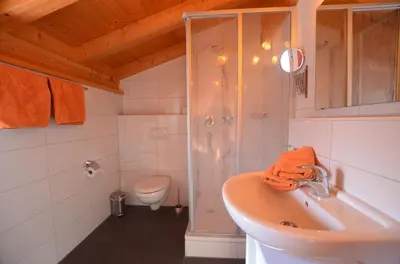 Ein Badezimmer in der Unterkunft Feriendorf Via Claudia Haus 100 Dominique