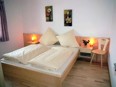 Ein Bett oder Betten in einem Zimmer der Unterkunft Gästehaus Weissenbauer