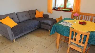 Ein Sitzbereich in der Unterkunft Gästehaus Weissenbauer