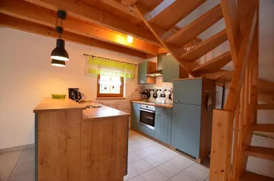 Küche/Küchenzeile in der Unterkunft Feriendorf Via Claudia Haus 52 Bunte Kuh