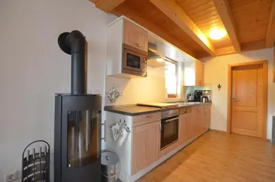 Küche/Küchenzeile in der Unterkunft Feriendorf Via Claudia Haus 53 Alpenrose