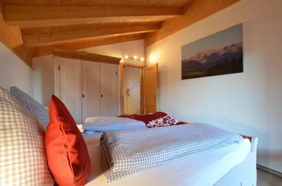 Ein Bett oder Betten in einem Zimmer der Unterkunft Feriendorf Via Claudia Haus 59 Gamsbock