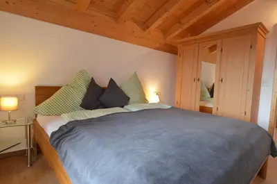 Ein Bett oder Betten in einem Zimmer der Unterkunft Feriendorf Via Claudia Haus 62 Bernhard