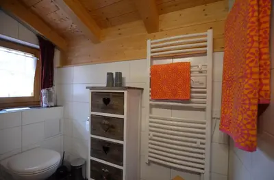 Ein Badezimmer in der Unterkunft Feriendorf Via Claudia Haus 64 Berg- und Seetraum