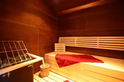 Ein Bett oder Betten in einem Zimmer der Unterkunft Feriendorf Via Claudia Haus 70 Augusta