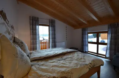 Ein Bett oder Betten in einem Zimmer der Unterkunft Feriendorf Via Claudia Haus 70 Augusta