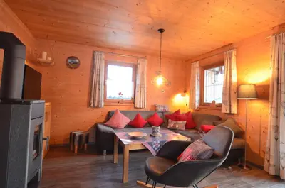 Ein Sitzbereich in der Unterkunft Feriendorf Via Claudia Haus 74 Allgäuglück