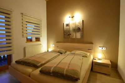 Ein Bett oder Betten in einem Zimmer der Unterkunft Feriendorf Via Claudia Haus 99 Julia