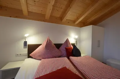 Ein Bett oder Betten in einem Zimmer der Unterkunft Feriendorf Via Claudia Haus 69 La Casita