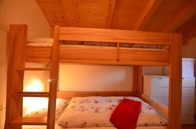 Ein Bett oder Betten in einem Zimmer der Unterkunft Feriendorf Via Claudia Haus 69 La Casita