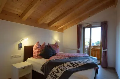 Ein Bett oder Betten in einem Zimmer der Unterkunft Feriendorf Via Claudia Haus 69 La Casita