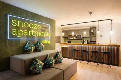 Küche/Küchenzeile in der Unterkunft Snooze Apartments Alling