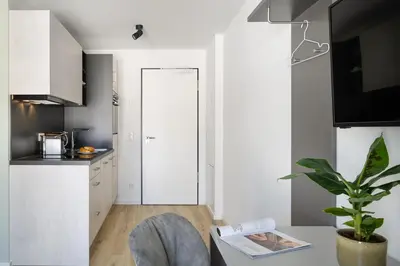 Küche/Küchenzeile in der Unterkunft Snooze Apartments Alling