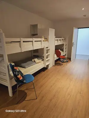 Ein Bett oder Betten in einem Zimmer der Unterkunft Estelada Hostel Berg am Laim
