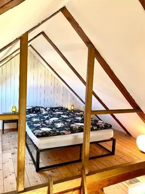 Ein Bett oder Betten in einem Zimmer der Unterkunft Ferienwohnung Nepomuk