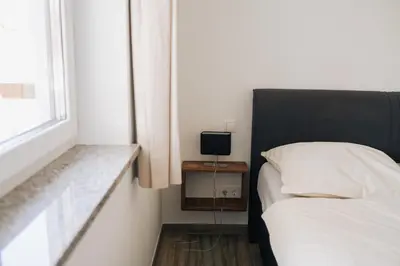 Ein Bett oder Betten in einem Zimmer der Unterkunft Gemütliche Wohnung mit großer Terrasse