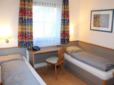 Ein Sitzbereich in der Unterkunft Ferienhaus Nr 35, Typ B, behindertenfreundlich, Feriendorf Hochbergle, Allgäu