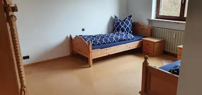 Ein Bett oder Betten in einem Zimmer der Unterkunft Stifter Apartments