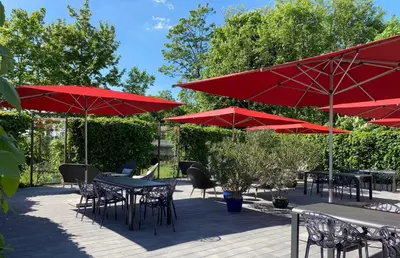 Ein Garten an der Unterkunft Das SinGold Hotel mit Highspeed WLAN und digitalem Schlüssel