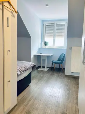 Ein Bett oder Betten in einem Zimmer der Unterkunft Das SinGold Hotel mit Highspeed WLAN und digitalem Schlüssel