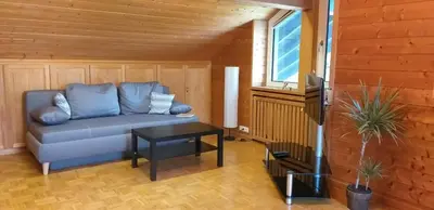 Ein Sitzbereich in der Unterkunft 2-Zimmer DG-Apartment mit eigener Sauna