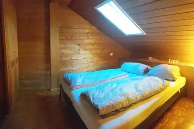 Ein Bett oder Betten in einem Zimmer der Unterkunft 2-Zimmer DG-Apartment mit eigener Sauna