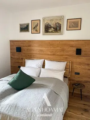 Ein Bett oder Betten in einem Zimmer der Unterkunft Alpenhoamat Apartments