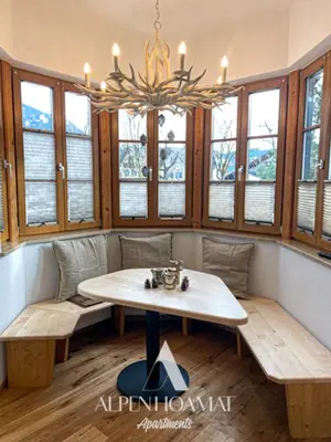 Ein Sitzbereich in der Unterkunft Alpenhoamat Apartments
