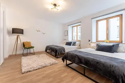 Ein Bett oder Betten in einem Zimmer der Unterkunft Lexapartments Altstadt zentral am Rathaus