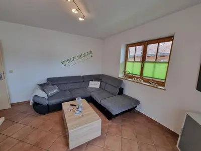 Ein Sitzbereich in der Unterkunft Ferienwohnung Am Golfplatz