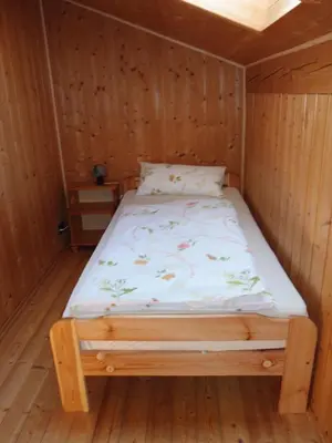Ein Bett oder Betten in einem Zimmer der Unterkunft Ferienwohnung Hein