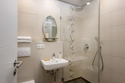 Ein Badezimmer in der Unterkunft Ferienwohnung Panoramablick - Alpenmagie Suites